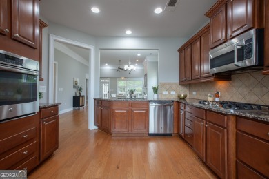 Nestled at the end of a serene cul-de-sac, this charming house on Lanier Island Legacy Golf Couorse in Georgia - for sale on GolfHomes.com, golf home, golf lot
