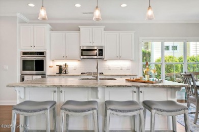 Welcome to 3590 Wood Crest Lane with gorgeous water views and on Members Club At St. James Plantation in North Carolina - for sale on GolfHomes.com, golf home, golf lot