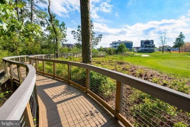 Presenting 33564 Windswept, an exceptional top-floor coastal on The Peninsula Golf and Country Club in Delaware - for sale on GolfHomes.com, golf home, golf lot