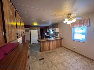 Looking for a spacious and affordable home in Butte? Look no on Highland View Golf Course - Highland View in Montana - for sale on GolfHomes.com, golf home, golf lot