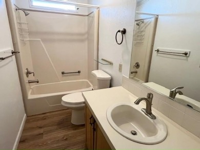 This Casa Grande model home has beautiful golf & water views on Del Tura Golf and Country Club in Florida - for sale on GolfHomes.com, golf home, golf lot