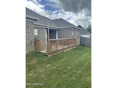 This METICULOUSLY maintained home features a welcoming front on Castlewoods Golf Club in Mississippi - for sale on GolfHomes.com, golf home, golf lot