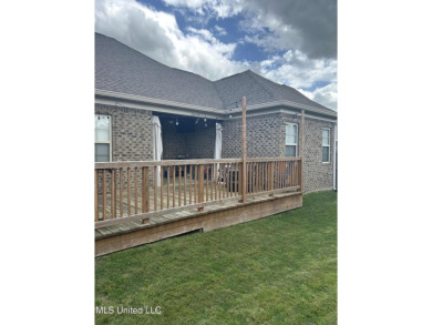 This METICULOUSLY maintained home features a welcoming front on Castlewoods Golf Club in Mississippi - for sale on GolfHomes.com, golf home, golf lot