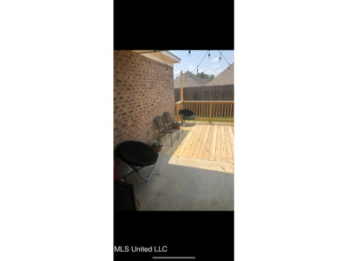 This METICULOUSLY maintained home features a welcoming front on Castlewoods Golf Club in Mississippi - for sale on GolfHomes.com, golf home, golf lot