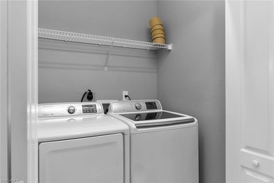 Beautifully maintained 2 bed / 2 bath second-floor condo with on The Club At Strand in Florida - for sale on GolfHomes.com, golf home, golf lot