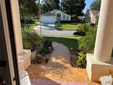 Welcome to this beautiful home, impeccably cared for, and on Meadow Oaks Golf and Country Club in Florida - for sale on GolfHomes.com, golf home, golf lot