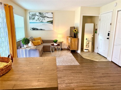Enjoy the Florida lifestyle in this sunny and upgraded condo on Largo Golf Course in Florida - for sale on GolfHomes.com, golf home, golf lot