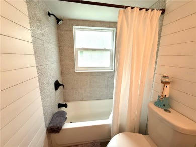Enjoy the Florida lifestyle in this sunny and upgraded condo on Largo Golf Course in Florida - for sale on GolfHomes.com, golf home, golf lot