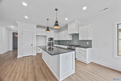 This beautifully crafted residence features an open floor plan on Canebrake Golf Club in Alabama - for sale on GolfHomes.com, golf home, golf lot