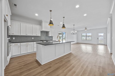 This beautifully crafted residence features an open floor plan on Canebrake Golf Club in Alabama - for sale on GolfHomes.com, golf home, golf lot