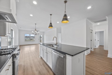 This beautifully crafted residence features an open floor plan on Canebrake Golf Club in Alabama - for sale on GolfHomes.com, golf home, golf lot