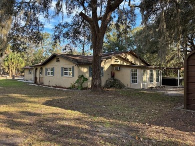 SELLER FINANCING ~ GOLF COURSE COMMUNITY ~ SPACIOUS 3 BED/2 BATH on Chiefland Golf and Country Club in Florida - for sale on GolfHomes.com, golf home, golf lot