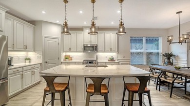 Welcome to resort-style living in Esplanade Azario at Lakewood on Esplanade Golf and Country at Lakewood Ranch in Florida - for sale on GolfHomes.com, golf home, golf lot