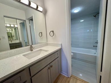 Beautifully updated second floor condo offers sweeping golf on Old Marsh Golf Club in Florida - for sale on GolfHomes.com, golf home, golf lot