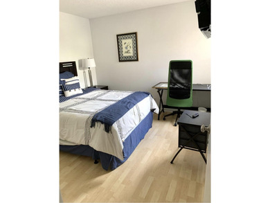 Beautifully updated second floor condo offers sweeping golf on Old Marsh Golf Club in Florida - for sale on GolfHomes.com, golf home, golf lot