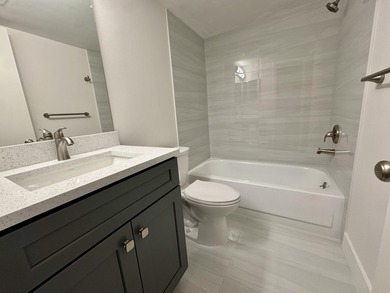 Beautifully updated second floor condo offers sweeping golf on Old Marsh Golf Club in Florida - for sale on GolfHomes.com, golf home, golf lot