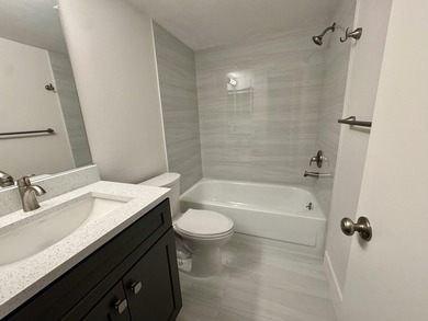 Beautifully updated second floor condo offers sweeping golf on Old Marsh Golf Club in Florida - for sale on GolfHomes.com, golf home, golf lot