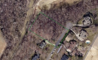 LISTED $21,700 BELOW TAX VALUE--Large building lot .96 acre in on Rock Barn Golf and Spa in North Carolina - for sale on GolfHomes.com, golf home, golf lot