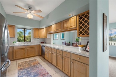 Tucked away on a flag lot, this sun-drenched 4-bedroom, 3-bath on Pukalani Country Club in Hawaii - for sale on GolfHomes.com, golf home, golf lot