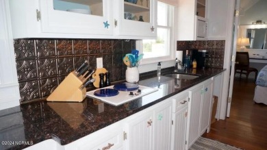 Captains Quarters Suite is a coastal gem. (K) Week Corner suite on Bald Head Island Golf Club in North Carolina - for sale on GolfHomes.com, golf home, golf lot