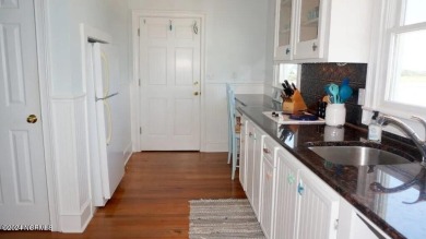 Captains Quarters Suite is a coastal gem. (K) Week Corner suite on Bald Head Island Golf Club in North Carolina - for sale on GolfHomes.com, golf home, golf lot