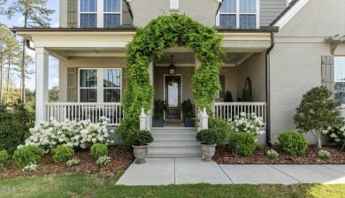 This stunning Braxton floorplan--one of the most sought-after on Hasentree Club in North Carolina - for sale on GolfHomes.com, golf home, golf lot
