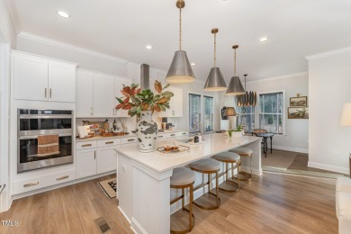 This stunning Braxton floorplan--one of the most sought-after on Hasentree Club in North Carolina - for sale on GolfHomes.com, golf home, golf lot