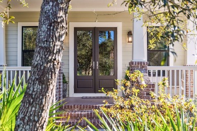 Tucked away on a quiet cul-de-sac, surrounded by magnolias and on Santa Rosa Golf and Beach Club in Florida - for sale on GolfHomes.com, golf home, golf lot