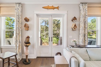 Tucked away on a quiet cul-de-sac, surrounded by magnolias and on Santa Rosa Golf and Beach Club in Florida - for sale on GolfHomes.com, golf home, golf lot