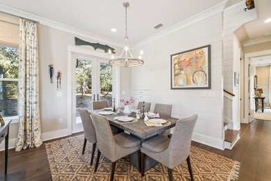 Tucked away on a quiet cul-de-sac, surrounded by magnolias and on Santa Rosa Golf and Beach Club in Florida - for sale on GolfHomes.com, golf home, golf lot