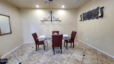 This beautifully maintained 4-bedroom, 3-bath home--with a on Blackstone Country Club in Arizona - for sale on GolfHomes.com, golf home, golf lot