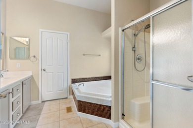 Set on a generous corner homesite in the desirable 55+ Villages on Quail Wood Greens Golf Course in Arizona - for sale on GolfHomes.com, golf home, golf lot