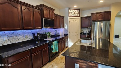 This beautifully maintained 4-bedroom, 3-bath home--with a on Blackstone Country Club in Arizona - for sale on GolfHomes.com, golf home, golf lot