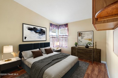 Set on a generous corner homesite in the desirable 55+ Villages on Quail Wood Greens Golf Course in Arizona - for sale on GolfHomes.com, golf home, golf lot