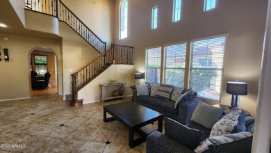 This beautifully maintained 4-bedroom, 3-bath home--with a on Blackstone Country Club in Arizona - for sale on GolfHomes.com, golf home, golf lot