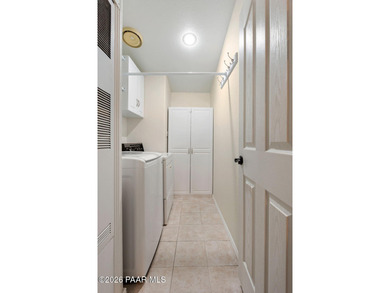 Set on a generous corner homesite in the desirable 55+ Villages on Quail Wood Greens Golf Course in Arizona - for sale on GolfHomes.com, golf home, golf lot