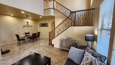 This beautifully maintained 4-bedroom, 3-bath home--with a on Blackstone Country Club in Arizona - for sale on GolfHomes.com, golf home, golf lot