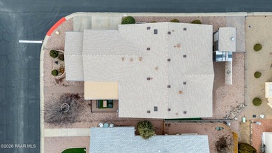 Set on a generous corner homesite in the desirable 55+ Villages on Quail Wood Greens Golf Course in Arizona - for sale on GolfHomes.com, golf home, golf lot