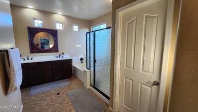 This beautifully maintained 4-bedroom, 3-bath home--with a on Blackstone Country Club in Arizona - for sale on GolfHomes.com, golf home, golf lot