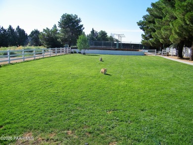 Set on a generous corner homesite in the desirable 55+ Villages on Quail Wood Greens Golf Course in Arizona - for sale on GolfHomes.com, golf home, golf lot