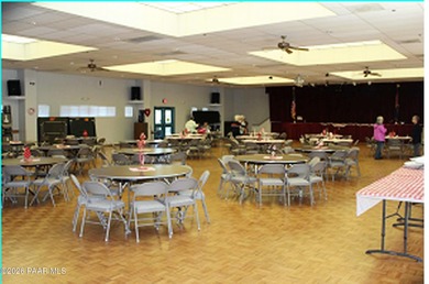 Set on a generous corner homesite in the desirable 55+ Villages on Quail Wood Greens Golf Course in Arizona - for sale on GolfHomes.com, golf home, golf lot