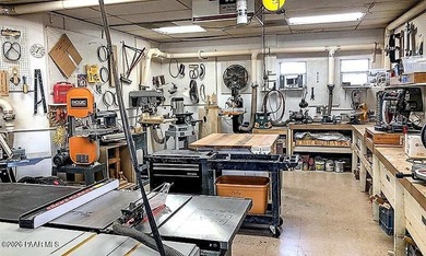 Set on a generous corner homesite in the desirable 55+ Villages on Quail Wood Greens Golf Course in Arizona - for sale on GolfHomes.com, golf home, golf lot