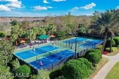 This beautifully appointed 'Bellisimo' second-floor coach home on Esplanade Golf and  Country Club in Florida - for sale on GolfHomes.com, golf home, golf lot