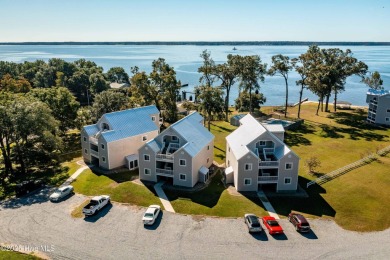This beautifully updated two-bedroom, two-bath second-floor on Minnesott Golf and Country Club in North Carolina - for sale on GolfHomes.com, golf home, golf lot