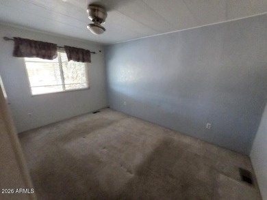 Spacious Mesa home offering a comfortable floor plan, generous on Fountain of the Sun Country Club in Arizona - for sale on GolfHomes.com, golf home, golf lot