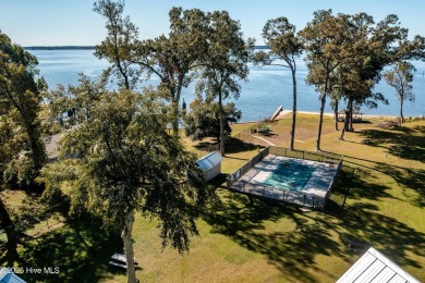 This beautifully updated two-bedroom, two-bath second-floor on Minnesott Golf and Country Club in North Carolina - for sale on GolfHomes.com, golf home, golf lot
