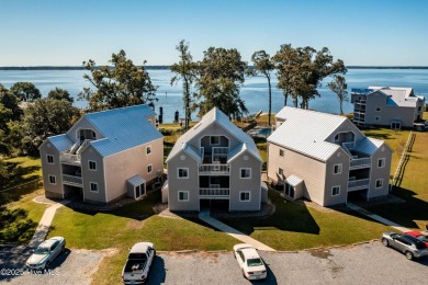 This beautifully updated two-bedroom, two-bath second-floor on Minnesott Golf and Country Club in North Carolina - for sale on GolfHomes.com, golf home, golf lot