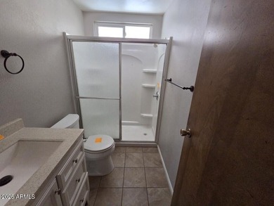 Spacious Mesa home offering a comfortable floor plan, generous on Fountain of the Sun Country Club in Arizona - for sale on GolfHomes.com, golf home, golf lot