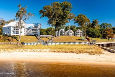 This beautifully updated two-bedroom, two-bath second-floor on Minnesott Golf and Country Club in North Carolina - for sale on GolfHomes.com, golf home, golf lot