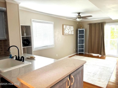 This beautifully updated two-bedroom, two-bath second-floor on Minnesott Golf and Country Club in North Carolina - for sale on GolfHomes.com, golf home, golf lot